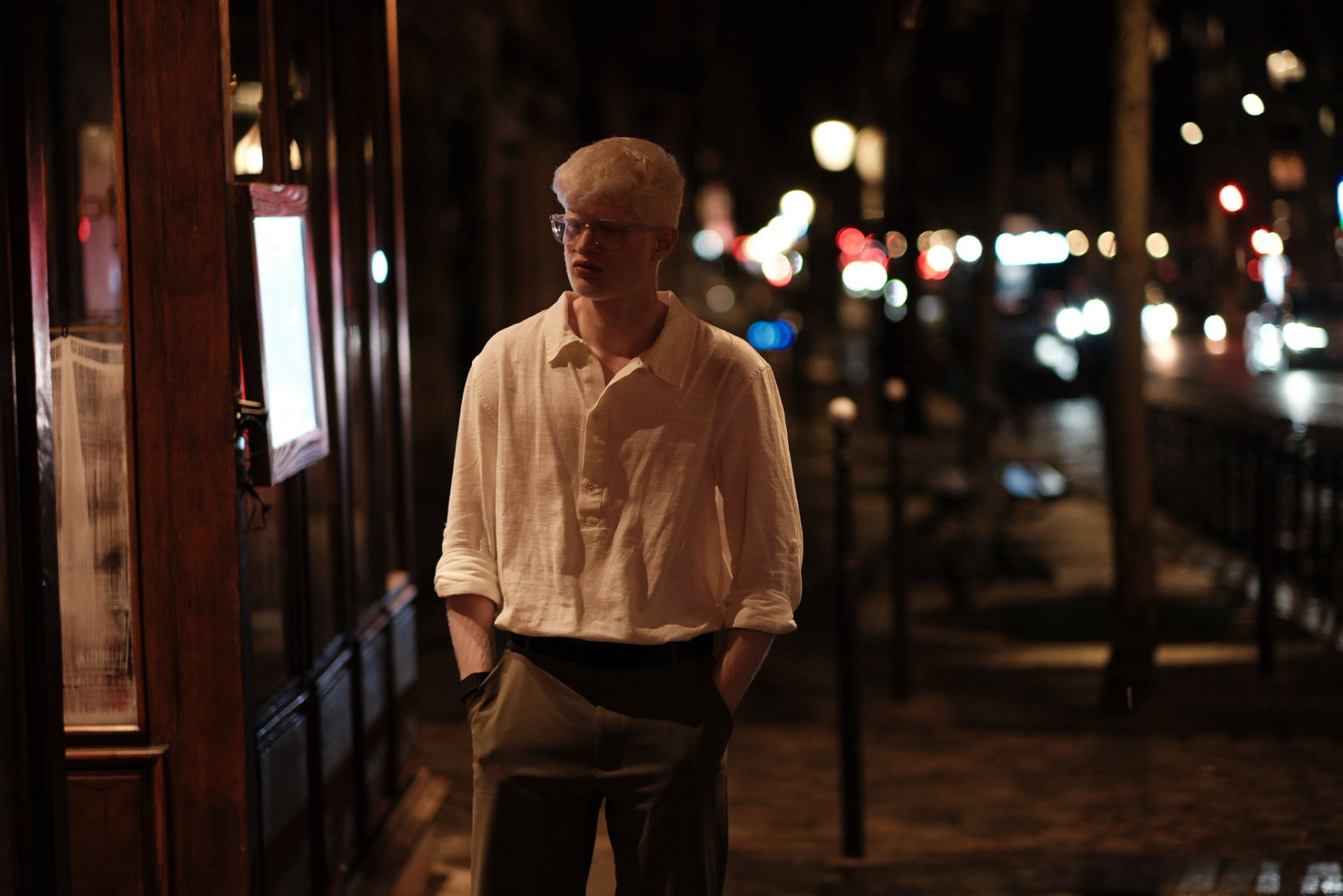 Tanush Soni standing on a street in the evening